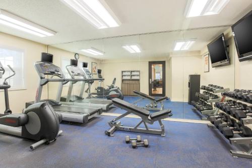 a gym with treadmills and machines in a room at Residence Inn by Marriott Atlanta Cumberland/Galleria in Atlanta