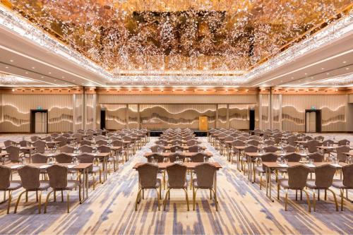 a large banquet hall with tables and chairs at The Ritz-Carlton, Istanbul at the Bosphorus in Istanbul