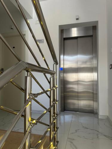an elevator in a building with a metal door at Sea Garden City in Termoli