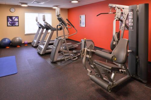 a gym with several tread machines in a room at TownePlace Suites by Marriott Las Vegas Henderson in Las Vegas
