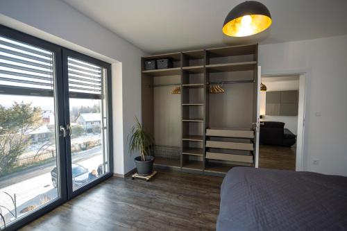 Postel nebo postele na pokoji v ubytování Apartmán AG