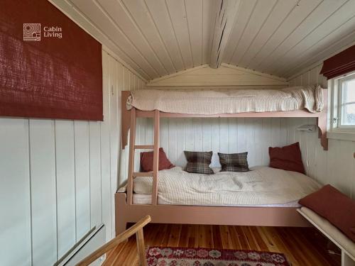Ένα ή περισσότερα κρεβάτια σε δωμάτιο στο Cozy cabin near Geilo & Dagali terrace, grill, fireplace, view & WiFi
