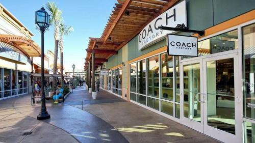 a shopping street in a city with shops at Charming 1BR Getaway - Private, Pet Friendly, TV in Texas City