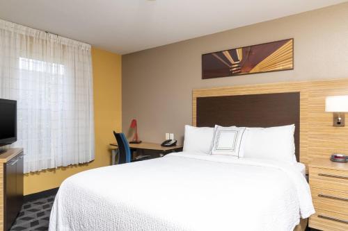 TV a/nebo společenská místnost v ubytování TownePlace Suites by Marriott East Lansing