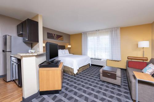 TV a/nebo společenská místnost v ubytování TownePlace Suites by Marriott East Lansing