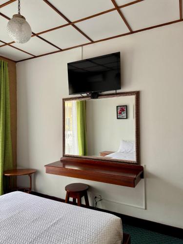 TV a/nebo společenská místnost v ubytování Hotel Malinche