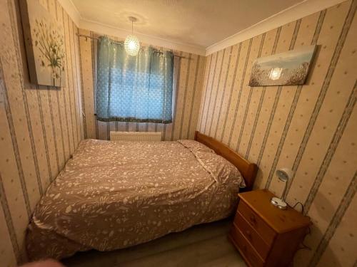 En eller flere senge i et værelse på 3 Bed Room House very close to town