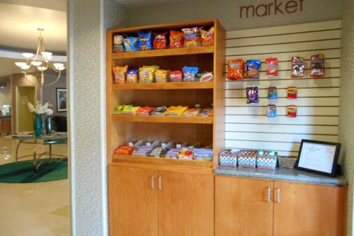 a food pantry with a shelf with food on it at SpringHill Suites by Marriott Morgantown in Morgantown
