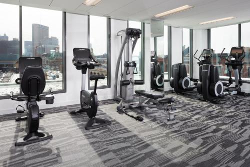 a gym with treadmills and exercise equipment in a building at Le Meridien Columbus, The Joseph in Columbus