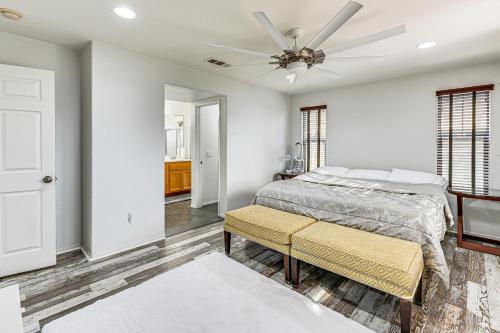 a bedroom with a bed and a ceiling fan at 20 Mi to Old Town San Diego Stay and Play! in Chula Vista