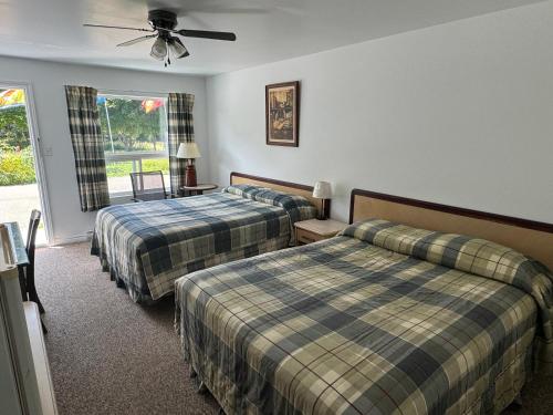 Katil atau katil-katil dalam bilik di The Fundy Rocks Resort