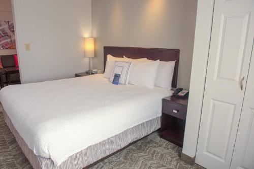 Ένα ή περισσότερα κρεβάτια σε δωμάτιο στο SpringHill Suites Houston Pearland
