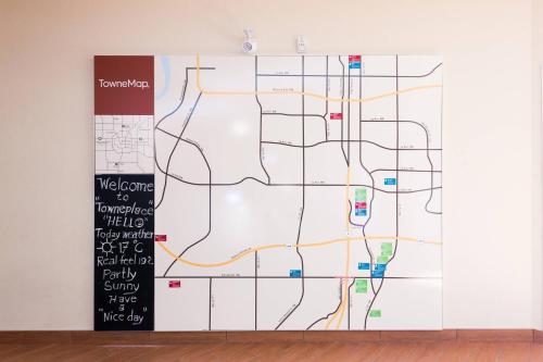 a large wall mural with a map on it at TownePlace Suites by Marriott Edmonton South in Edmonton
