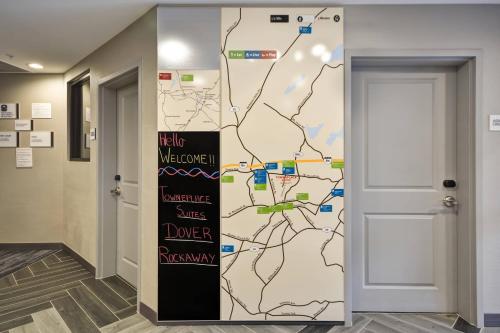 a wall mural in a hallway with a map at TownePlace Suites by Marriott Dover Rockaway in Dover