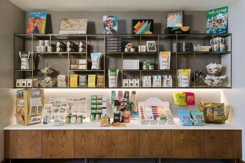 a store counter with books and other items on it at The Westin Raleigh-Durham Airport in Raleigh