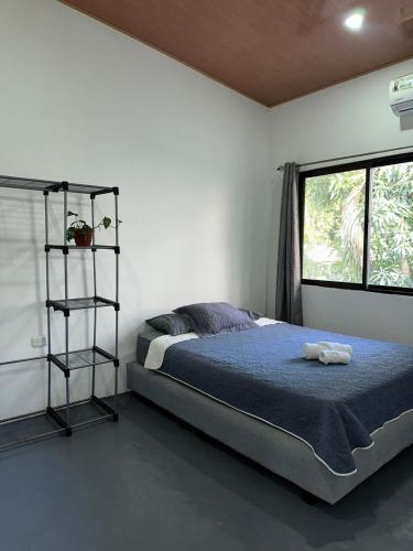 Giường trong phòng chung tại Studio Koba 6