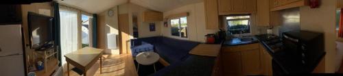 a view of a small kitchen in an rv at Mobil-Home le 70 du White Port in Dinard