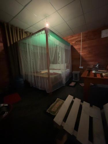 Postel nebo postele na pokoji v ubytování Woodland Hideaway in Sinharaja
