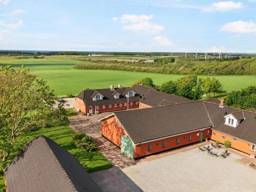 an overhead view of a farm with houses and trees at Cozy Coastal Retreat - By Traum Ferienwohnungen in Hjørring