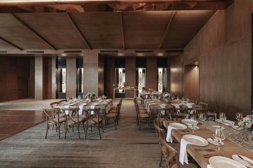 a large room with tables and chairs in it at JW Marriott Hotel Mexico City Polanco in Mexico City