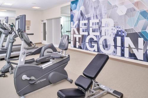 a gym with two tread machines and a treadmill at SpringHill Suites Ashburn Dulles North in Ashburn