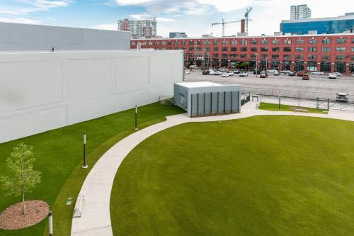 an aerial view of a building with a green lawn at JW Marriott Nashville in Nashville