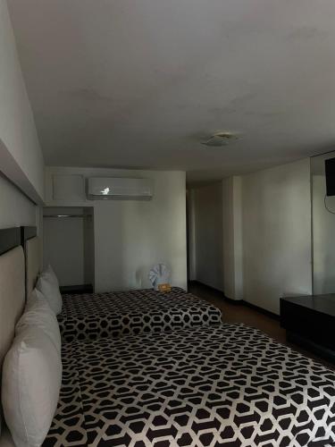 Кровать или кровати в номере Hotel Essen's