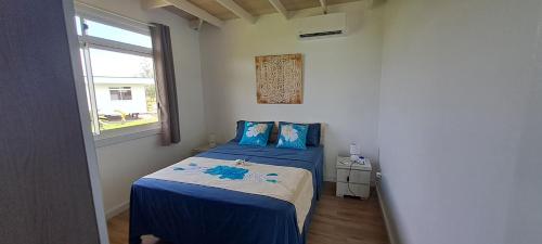 Voodi või voodid majutusasutuse Marina Village Raiatea toas