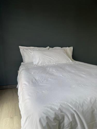 Ένα ή περισσότερα κρεβάτια σε δωμάτιο στο Willowbush Village Nest