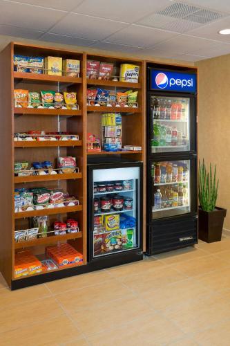 a grocery store with two refrigerators and food at Residence Inn Appleton in Appleton