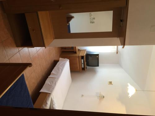 an overhead view of a room with a bed and a cabinet at Vera Bed and Breakfast in Umag