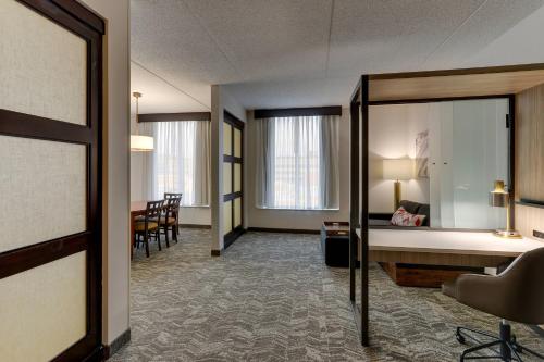 a hotel room with a bed and a desk at SpringHill Suites by Marriott Birmingham Downtown at UAB in Birmingham
