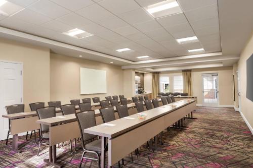 a conference room with rows of tables and chairs at Residence Inn by Marriott Philadelphia West Chester/Exton in Exton