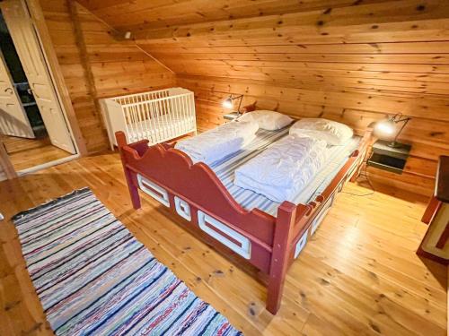 Ένα ή περισσότερα κρεβάτια σε δωμάτιο στο 10 person holiday home in KVINESDAL