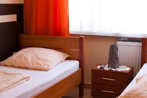 Postel nebo postele na pokoji v ubytování Hotel Elda 2