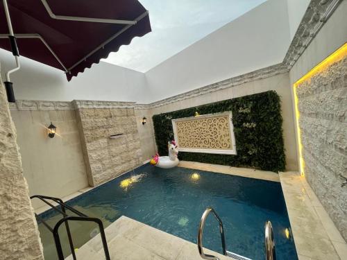Πισίνα στο ή κοντά στο Villa Fitsu Bhuvana