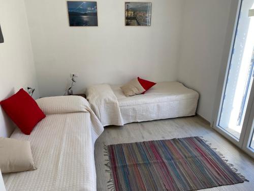 Ένα ή περισσότερα κρεβάτια σε δωμάτιο στο Villa Carlotta Rossa - Holiday Home with garden and pool