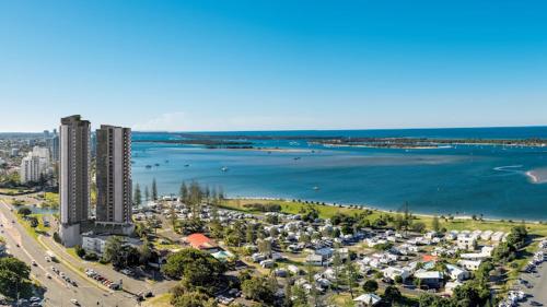 an aerial view of a beach with buildings and the water at Cityscape Serenity at Southport in Gold Coast