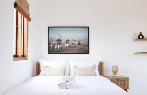 Ένα ή περισσότερα κρεβάτια σε δωμάτιο στο Pomelo Travel Outpost Bali