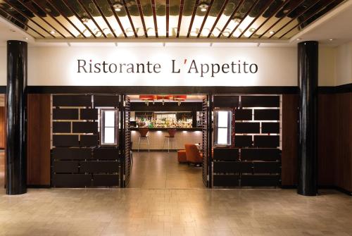 a dressing room with aitage lappitus sign on the wall at Imperial Hotel in Copenhagen