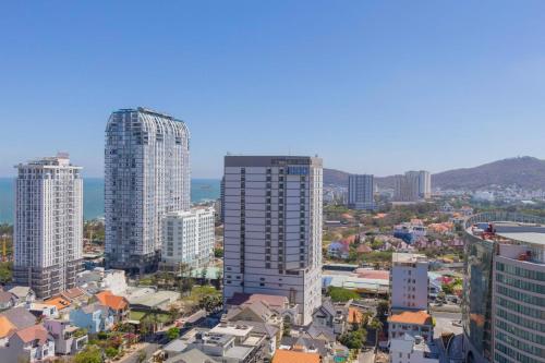 an aerial view of a city with tall buildings at The Sóng Vũng Tàu- SAO VIỆT Căn Hộ Nghỉ Dưỡng 5 Sao in Vung Tau