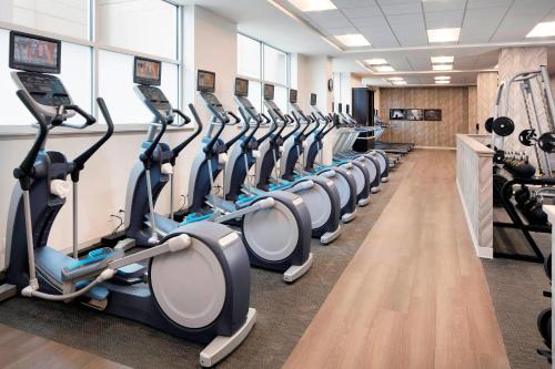a row of treadmills in a gym at SpringHill Suites Indianapolis Downtown in Indianapolis