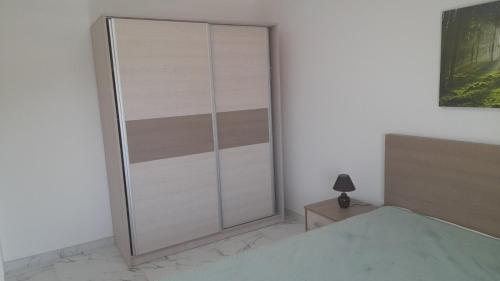 Una cama o camas en una habitación de Sokobanja Apartmani