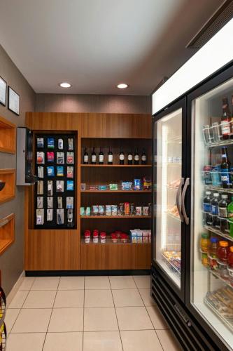 a store with a refrigerator filled with lots of food at SpringHill Suites Boise West/Eagle in Boise