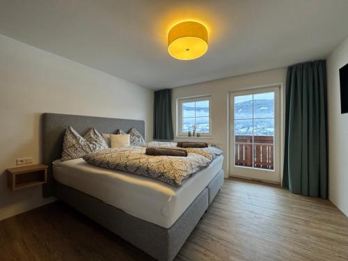 En eller flere senge i et værelse på Appartement Radstadtblick