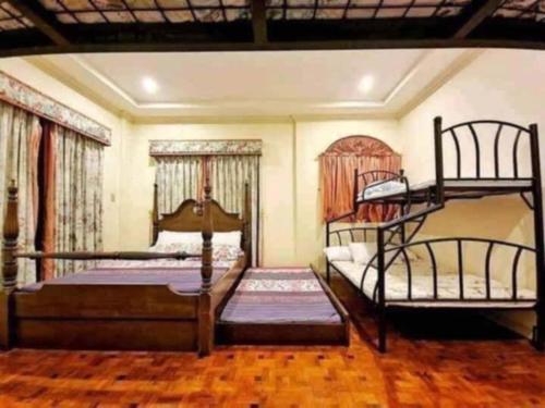 Postel nebo postele na pokoji v ubytování Princess Muffin Resort