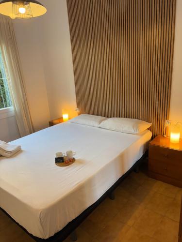 Ένα ή περισσότερα κρεβάτια σε δωμάτιο στο Holidays Oasis Roses marítim
