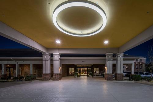 a large building with a large light on the ceiling at SpringHill Suites by Marriott Denton in Denton