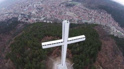 a white cross in the middle of a city at 3 Rooms Apartment, Top Center, 1st Floor, AUBG, WiFi, PC i5 SSD, Tablet, AndroidMiTvBox, 3 LED TVs 200 Channels, Long Terrace, Self-Easy-Late Check-in, Stay Before Greece in Blagoevgrad