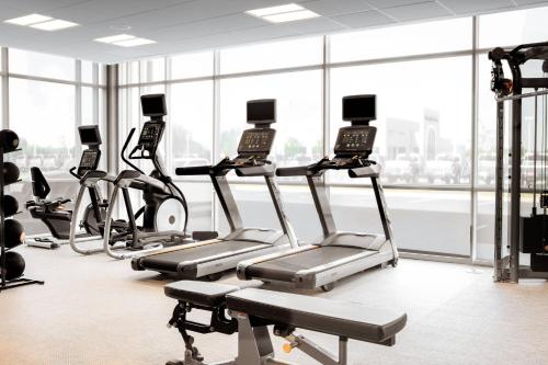 a row of cardio machines in a gym at SpringHill Suites by Marriott Ames in Ames